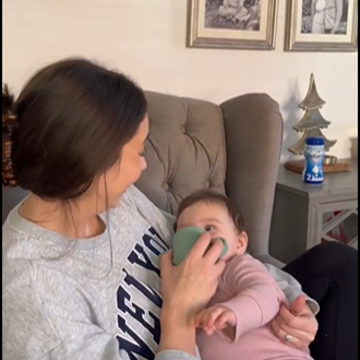 mom and baby on kichen counter